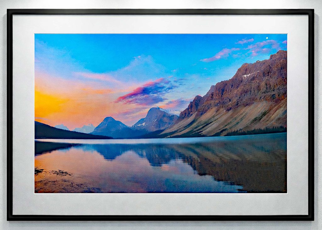 Dawn’s Early Light at Bow Lake
Banff National Park
July 7, 2023

As moonrise yields to the gentle light of dawn, Crowfoot Mountain and Bow Peak emerge in quiet clarity, their forms mirrored in the still waters of Bow Lake. This photograph marked the moment I discovered a lasting passion for landscape photography.
