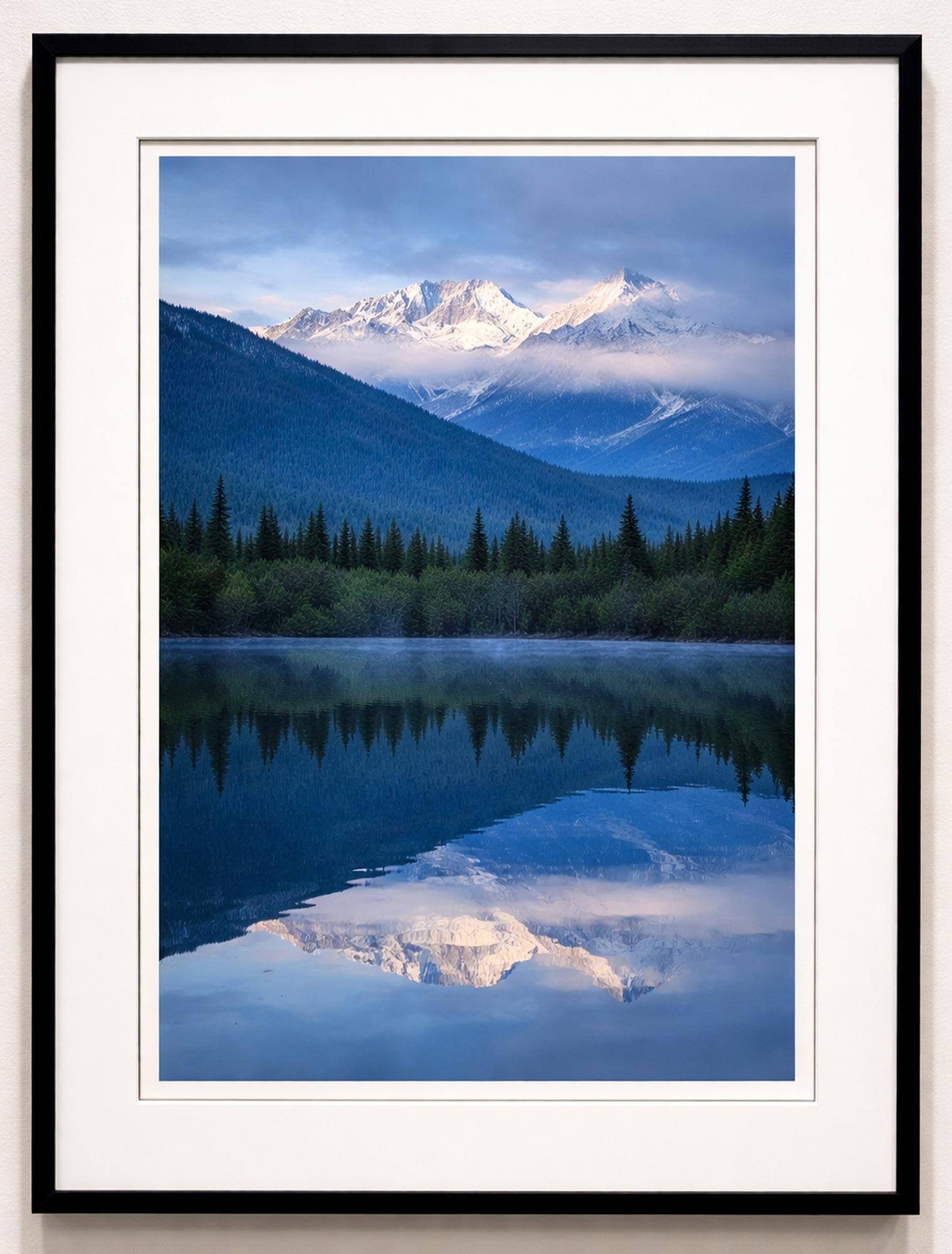 Dawn Reveals Stoney Squaw Mountain
Banff National Park
June 19, 2024

To me, dawn is the most compelling moment of the day—when the rising sun gradually burns away a blanket of cloud, revealing the brilliance of snow-capped peaks in the Rocky Mountains.
